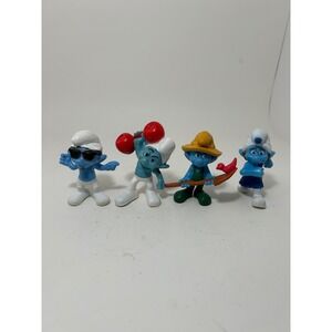 Lot of 4 Smurfs PVC Figures McDonald's Happy Meal Toys Hefty Farmer Gutsy Smooth